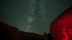 The 'Milky Way' is seen in the night sky over rocks in the natural reserve area of Wadi Al-Hitan, or the Valley of the Whales, at the desert of Al Fayoum Governorate, southwest of Cairo