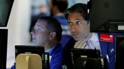 Traders work on the floor of the New York Stock Exchange (NYSE) in New York City, U.S.