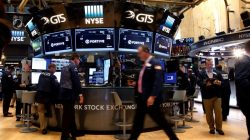 Traders work on the floor of the New York Stock Exchange (NYSE) in New York City, U.S., July 12, 2016.