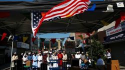 Muslim men attend Eid al-Fitr prayers to mark the end of the holy fasting month of Ramadan in the Queens borough of New York