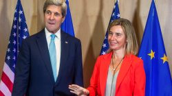 U.S. Secretary of State Kerry poses with EU foreign policy chief Mogherini during an EU foreign ministers meeting in Brussels
