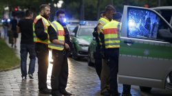 Police meet at scene of shooting rampage in Munich
