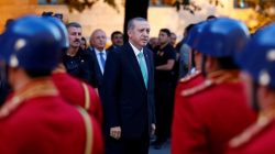 Turkish President Tayyip Erdogan reviews a guard of honour as he arrives to the Turkish Parliament in Ankara, Turkey, Ju