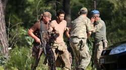 Turkish soldiers detain Staff Sergeant Erkan Cikat, one of the missing military personnel suspected of being involved in the coup attempt, in Marmaris, Turkey