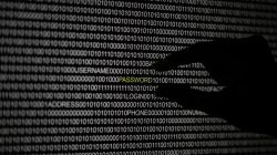 Hand in front of computer