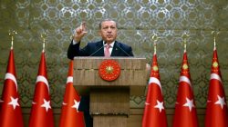 Turkey's President Tayyip Erdogan addresses the audience during a meeting at the Presidential Palace in Ankara, Turkey,