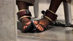 n this photo, reviewed by a U.S. Department of Defense official, a Guantanamo detainee's feet are shackled to the floor as he attends a "Life Skills" class inside the Camp 6 high-security detention facility at Guantanamo Bay U.S