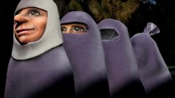 A carnival float with papier-mache figures representing women dressed with Burkas, is pictured during the traditional Rose Monday carnival parade in the western German city of Duesseldorf