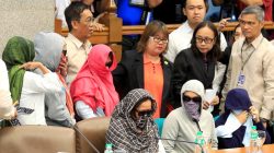 Relatives of slain people attend a Senate hearing investigating drug-related killings at the Senate headquarters in Manila