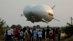 The Airlander 10 hybrid airship makes its maiden flight at Cardington Airfield in Britain