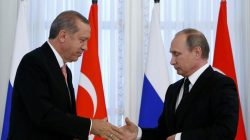 Russian President Putin shakes hands with Turkish President Erdogan during news conference following their meeting in St. Petersburg
