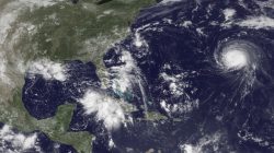 Three storm systems are shown (L TO R) Tropical Depression Nine to the southeast of Florida, Tropical Depression Eight just off the coast of the Carolinas and Hurricane Gaston in the central Atlantic Ocean are shown in this GOES East satellite image captured August 29, 2016.