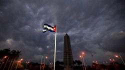 A Cuban flag flies at the Palace of the Revolution in Havana, Cuba