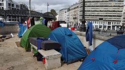 Migrants tents are seen at a makeshift camp on a street, northern Paris, France,