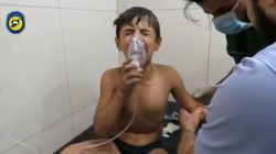 A still image taken on September 7, 2016 from a video posted on social media said to be shot in Aleppo's Al Sukari on September 6, 2016, shows a boy breathing with an oxygen mask inside a hospital, after a suspected chlorine gas attack