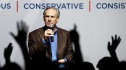 Texas Governor Greg Abbott speaks at a campaign rally for U.S. Republican presidential candidate Ted Cruz in Dallas, Texas