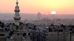 The sun sets over Aleppo as seen from rebel-held part of the city