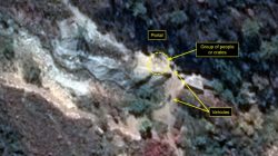 A satellite image of the area around North Korea's Punggye-Ri nuclear test site shows graphics pointing to what monitoring group 38 North says are signs of increased activity, in a photo released by the 38 North group