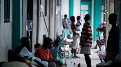 Relatives and patients treated for cholera after Hurricane Matthew in the Hospital of Port-a-Piment, Haiti,