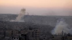 Smoke rises from Bustan al-Basha neighborhood of Aleppo, Syria,