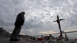 A woman stands near a memorial to the victims of the July 14 attack on the Promenade des Anglais, two days before a national tribute in Nice, France, October 12, 2016. REUTERS