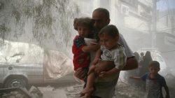 residents fleeing an air strike in Damascus, Syria