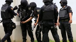 SWAT team prepares tear gas in Philippines