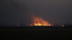 Smoke rises after strikes on Syria Democratic Forces (SDF) controlled Tell Rifaat town, northern Aleppo province, Syria