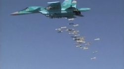 A still image, taken from video footage and released by Russia's Defence Ministry on August 18, 2016, shows a Russian Sukhoi Su-34 fighter-bomber based at Iran's Hamadan air base dropping off bombs in the Syrian province of Deir ez-Zor. Ministry of Defence of the Russian Federation/
