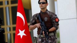 A Turkish special forces police officer guards the entrance of the Presidential Palace in Ankara, Turkey,