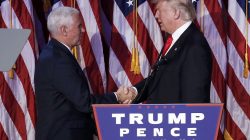 U.S. President-elect Donald Trump greets his running mate Mike Pence during his election night rally in Manhattan, New York