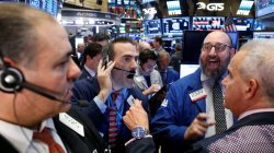 Traders work on the floor of the New York Stock Exchange (NYSE) the day after the U.S. presidential election in New York City,