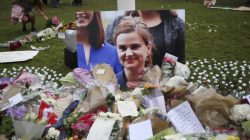 Tributes in memory of murdered Labour Party MP Jo Cox, who was shot dead in Birstall, are left at Parliament Square in London, Britain June 18, 2016.