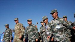 Liu Xiaowu (C), army commander of the Chinese southern military region, and General Robert Brown (2nd L), commanding general of the U.S. Army Pacific, attend a session as the Chinese and U.S. armed forces hold joint humanitarian relief drills in Kunming, Yunnan province, China