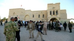 Fighters from the "Kataeb Babylon", a group of Christian fighters who fight alongside the Hashd Shabi, Shi'ite fighters, gather at the Mar Behnam monastery after the town was recaptured from the Islamic State, in Ali Rash, southeast of Mosul, Iraq