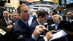 Traders work on the floor of the New York Stock Exchange (NYSE)