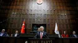 Turkey's Prime Minister Binali Yildirim addresses members of parliament from his ruling AK Party (AKP) during a meeting at the Turkish parliament in Ankara, Turkey,