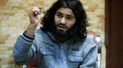 Former bakery worker Walid Ismail speaks during an interview with Reuters in a Kurdish security compound in the city of Erbil, Iraq