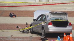 A car which police say was used by an attacker to plow into a group of students is seen outside Watts Hall on Ohio State University's campus in Columbus, Ohio.