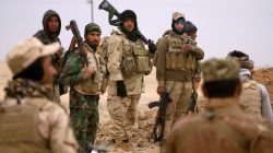 Members of the Lions of the Tigris, a group of Sunni Arab fighters and part of the Hashid Shaabi (Popular Mobilization Comimittee) take part during a military operation against Islamic State militants in Shayyalah al-Imam, Iraq