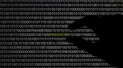 A hand is silhouetted in front of a computer screen in this picture illustration taken in Berlin