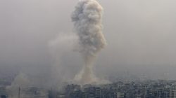 smoke rises after air strike