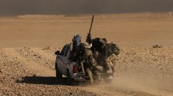 Iraqi forces backed by tribal militias during battle to retake a village from the Islamic State on the eastern bank of the river Tigris, Iraq