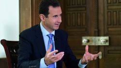 Syria's President Bashar al-Assad speaks during an interview with a Portuguese television channel