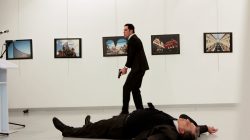 Russian Ambassador to Turkey Andrei Karlov lies on the ground after he was shot by unidentified man at an art gallery in Ankara.