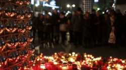 Candles burn at a Christmas market at Breitscheidplatz in Berlin, Germany, December 20, 2016, to commemorate the 12 victims of a truck that ploughed into the crowded market.