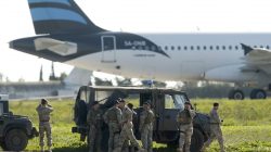 Maltese troops survey a hijacked Libyan Afriqiyah Airways Airbus A320 on the runway at Malta Airport, December 23,