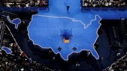 U.S. Democratic presidential nominee Hillary Clinton's campaign chairman John Podesta walks off the stage after addressing supporters at the election night rally in New York, U.S.,