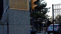 A guard screens cars entering the Russian embassy on Wisconsin Avenue in Washington, U.S.