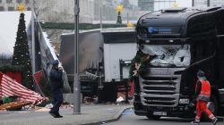 Police stand in front of the truck used in the Berlin Christmas Market Attack